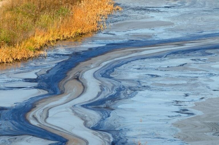Improper Hazardous Waste Disposal Repercussions Contaminated River in Houston, TX, showcasing Improper Hazardous Waste Disposal