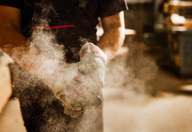 Professional Team at Excel Industrial Group Removing Dust at a Houston Worksite