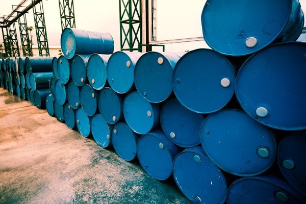 Professionals Discussing Chemical Trading Documents in Houston, TX