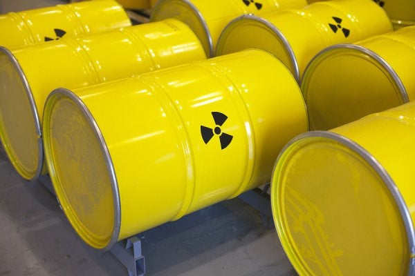 Workers in Safety Gear Handling Hazardous Waste Disposal in Houston, TX